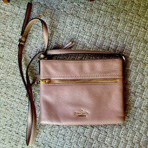 Kate Spade zippered crossbody bag.